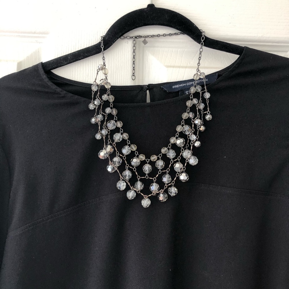 Necklace with moody stone finish